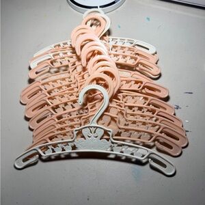 Set 16 of Peach and Cream 18” doll sized Hangers